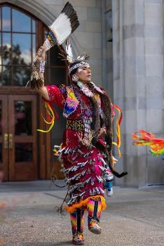 Indigenous person with Jingle Cone